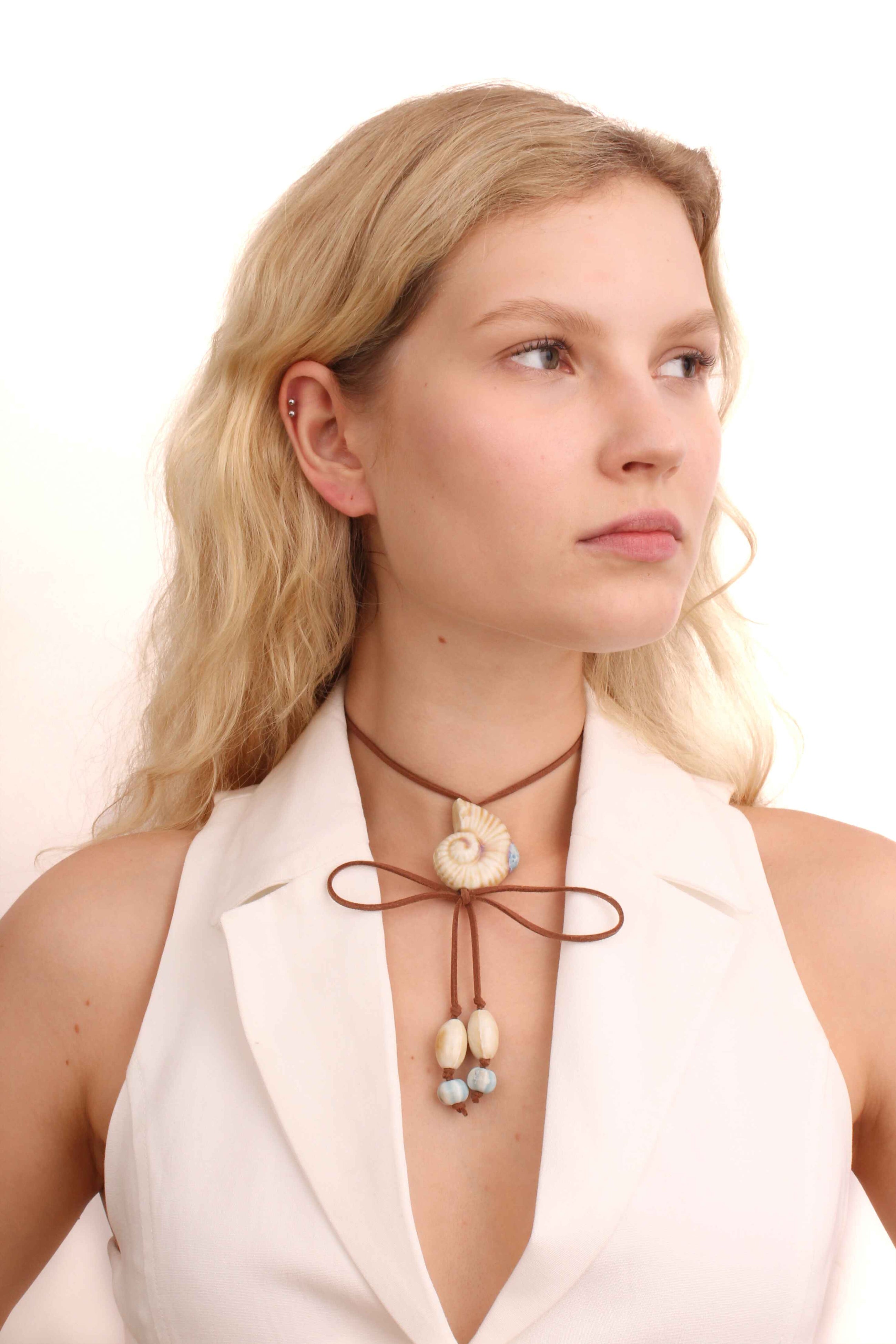 Brown Suede Cord Necklace With Ceramic Seashell Tie Charm.