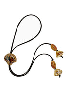 Black Suede Cord Necklace With Ceramic Seashell Tie Charm.